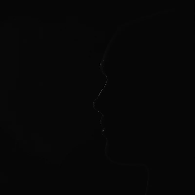 shadow-crafted avatar portrait with strong crop performance and black profile mood