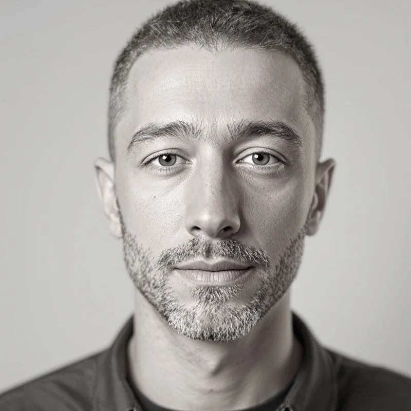 Grey avatar portrait with minimal aesthetic and identity